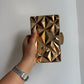 CLUTCH IN METTALLO ORO